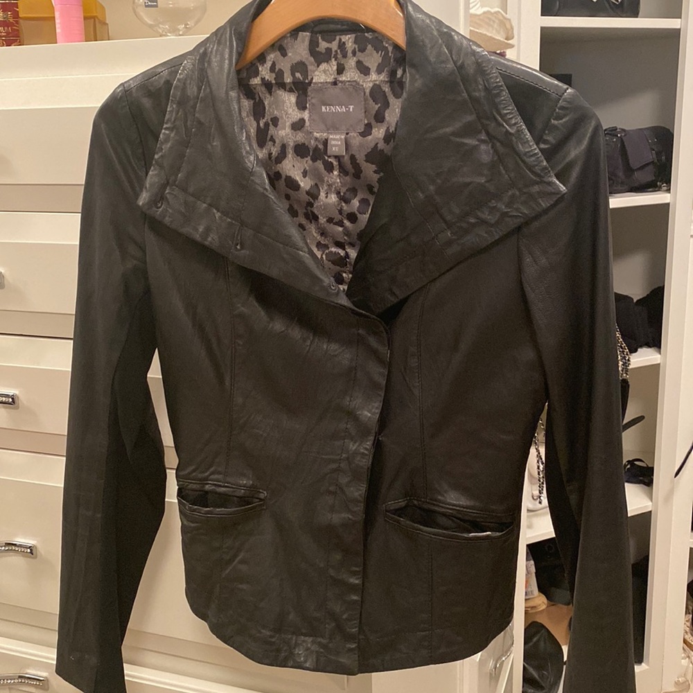 Leather jacket with cheetah lining